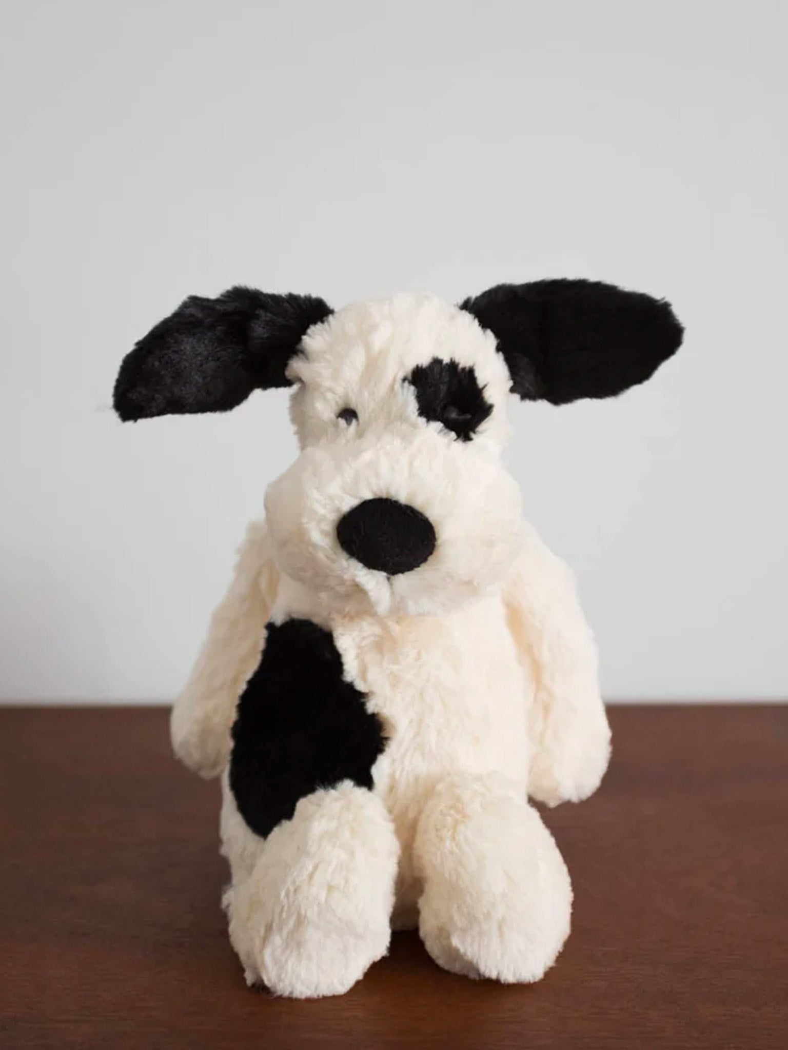 Jellycat Bashful Black & Cream Puppy – Hands
