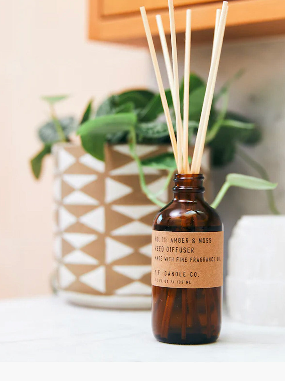 Amber Sunrise Reed Diffuser P.F. Candle Co. Reed Diffuser - No. 11 Amber & Moss – Hands